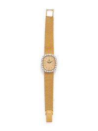 UNIVERSAL GENEVE, 18K YELLOW GOLD AND DIAMOND WRISTWATCH