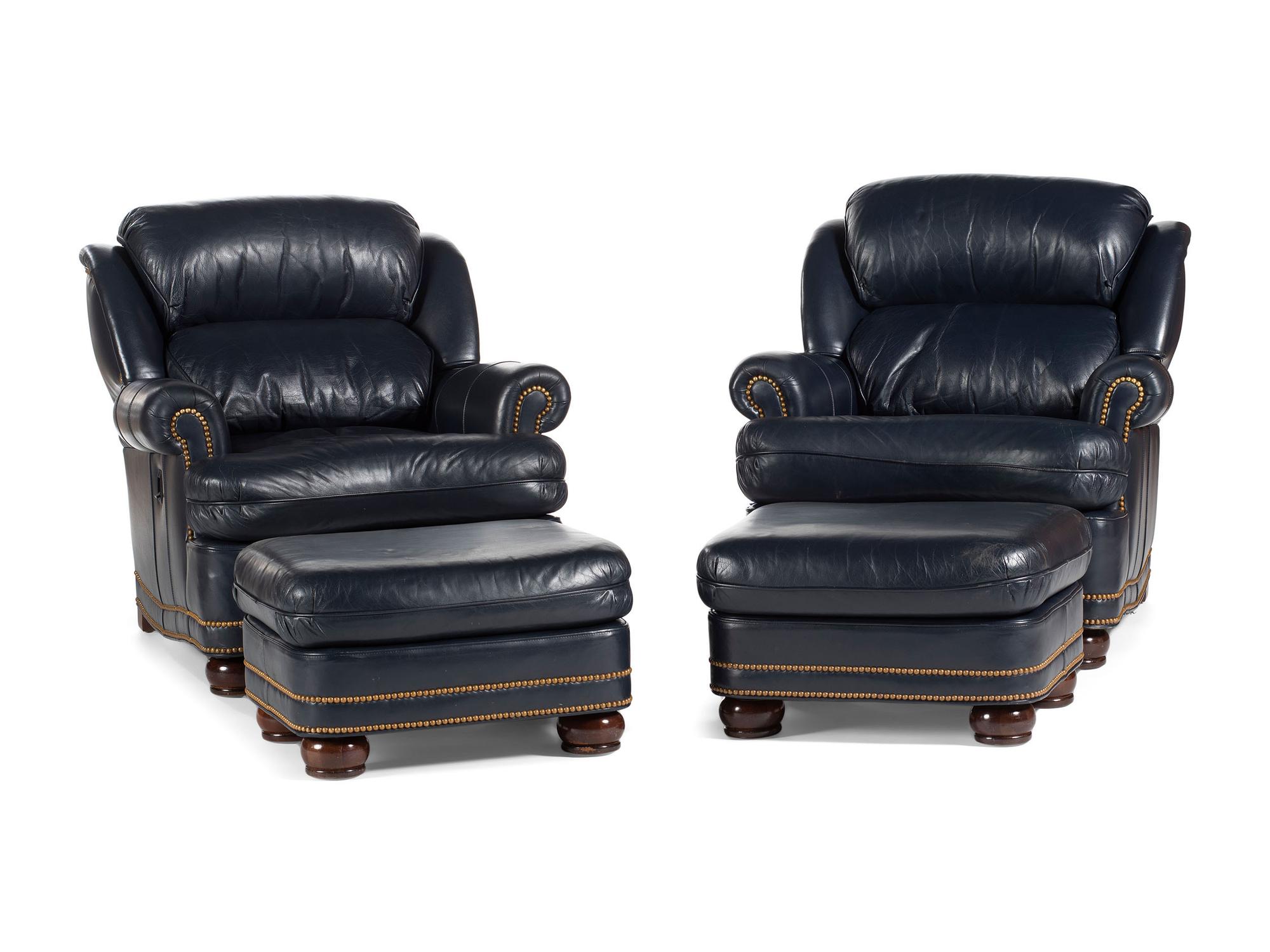 A Pair of Hancock and Moore Brass-Tacked Leather Chairs