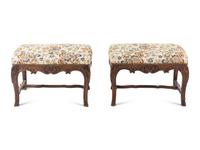 A Pair of Louis XV Style Carved Benches