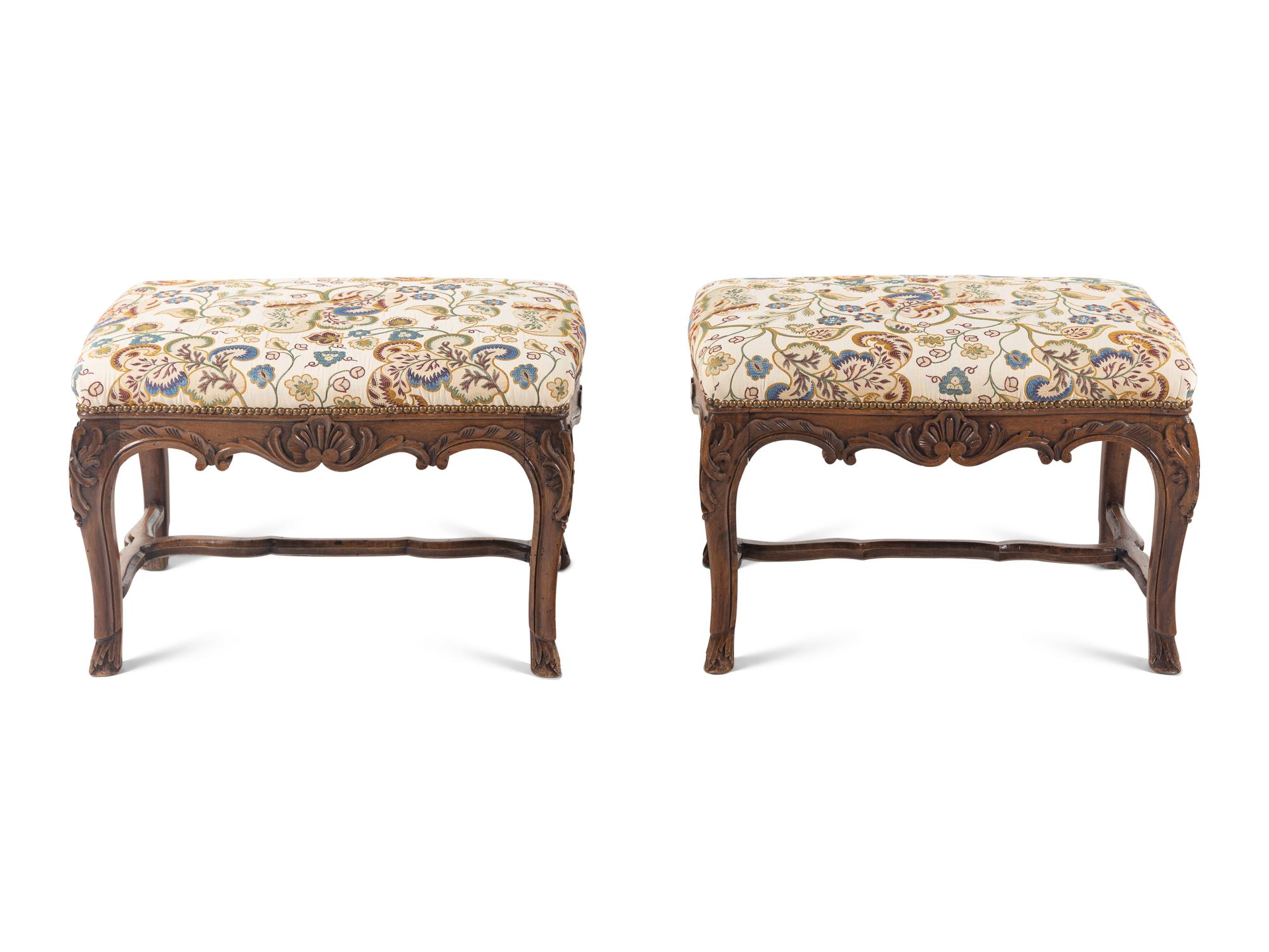 A Pair of Louis XV Style Carved Benches