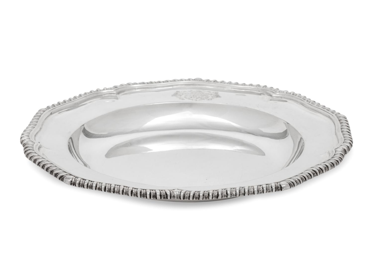 A Set of Twelve Silver Armorial Soup Plates