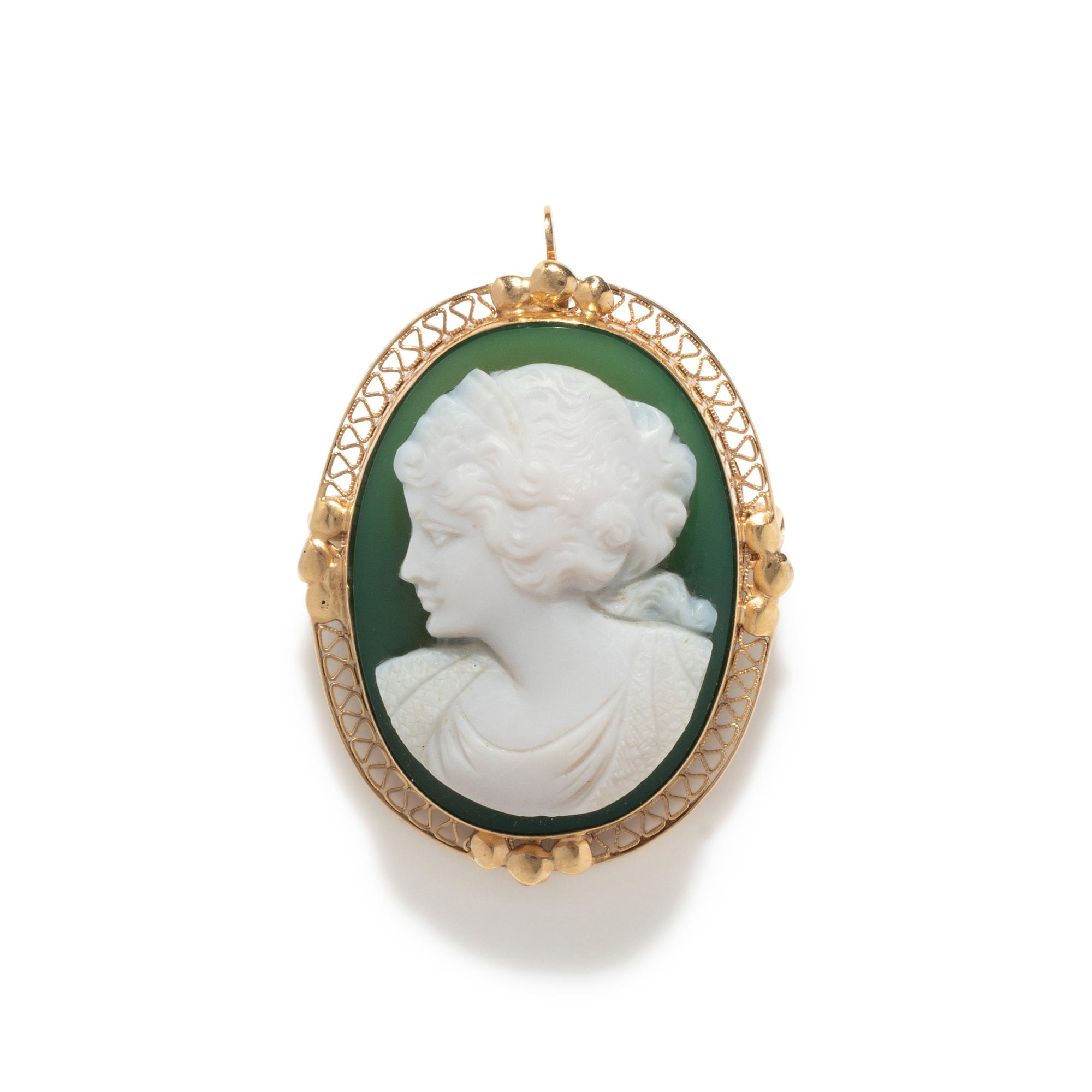 A Victorian Green Glass Cameo Brooch with a Female Portrait Bust