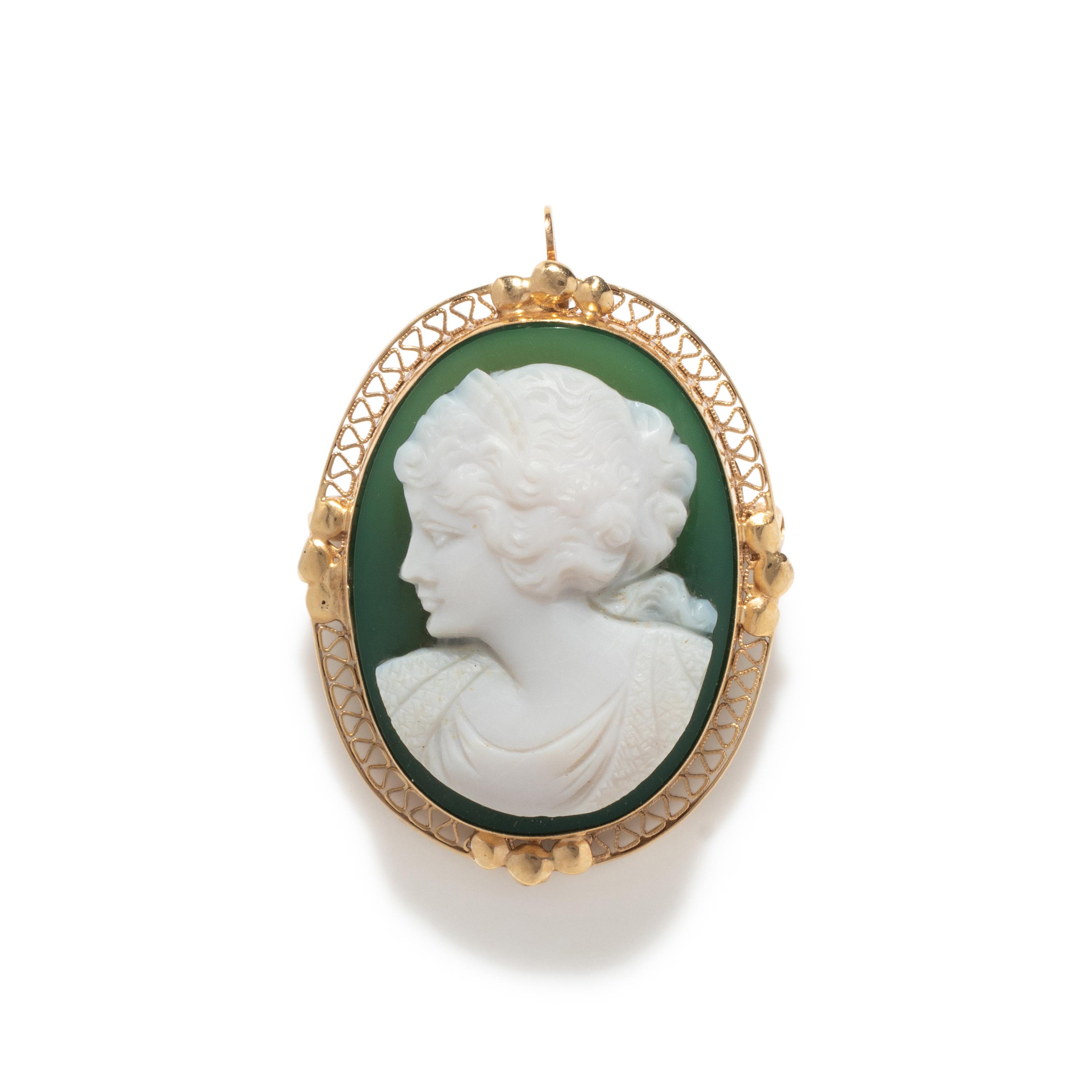 A Victorian Green Glass Cameo Brooch with a Female Portrait Bust