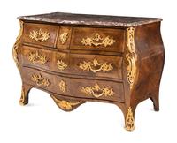 A Louis XV Gilt Bronze Mounted Tulipwood Commode