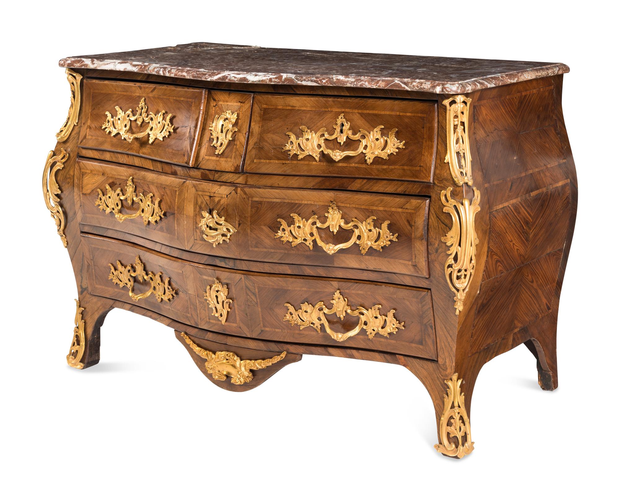 A Louis XV Gilt Bronze Mounted Tulipwood Commode