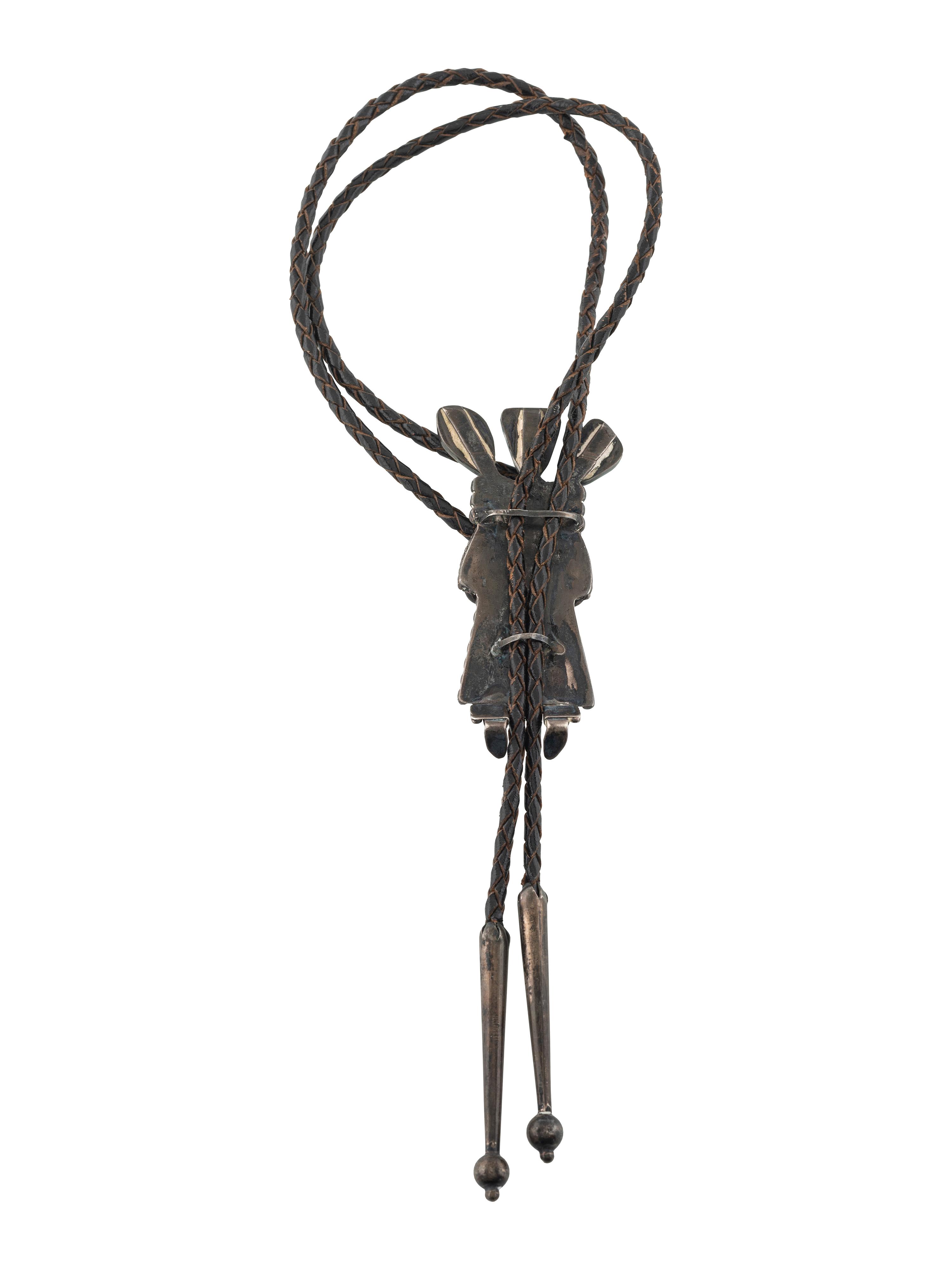 A Navajo Silver and Turquoise Katsina Bolo