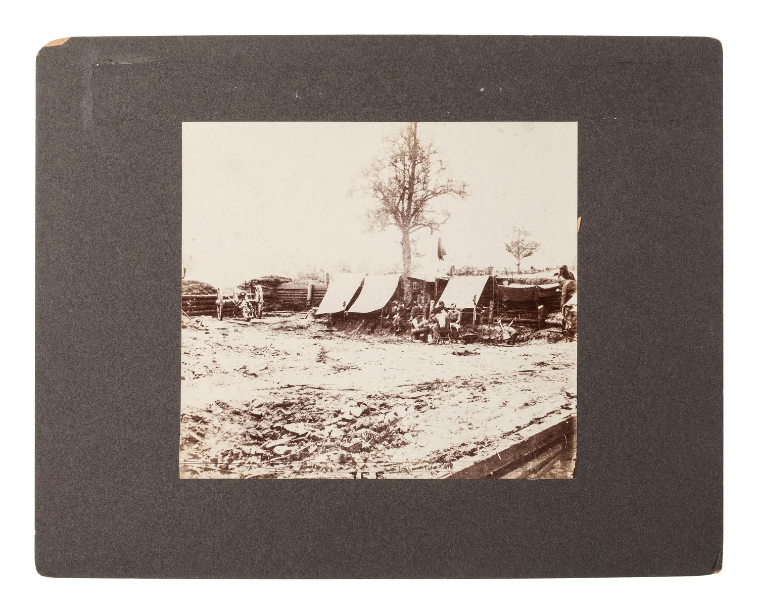 [CIVIL WAR]. A group of 2 photographs with Civil War subject matter, incl. General Ferrero with officers of the IX Corps at Petersburg and Union troops occupying a Confederate redoubt on the North Anna River.