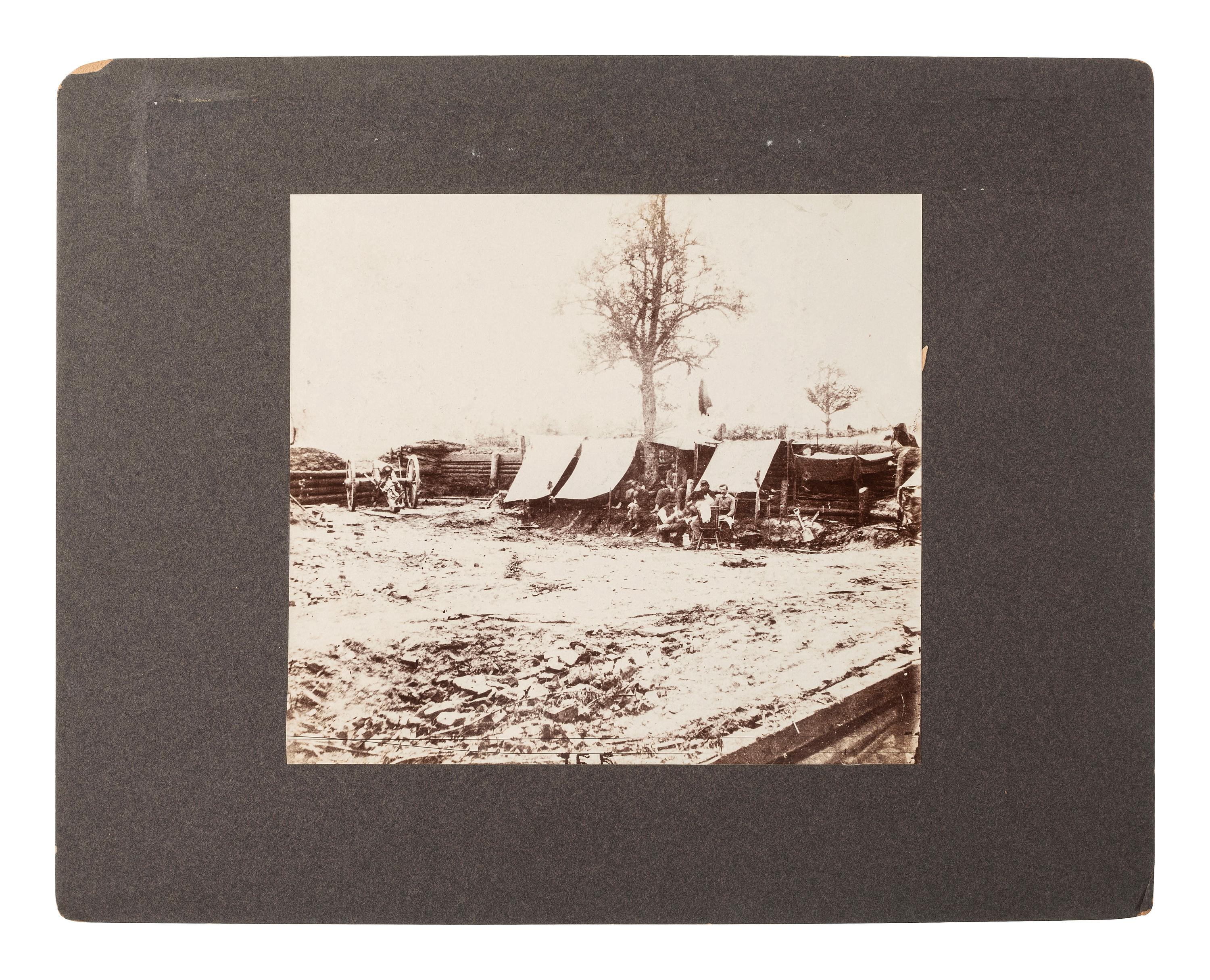 [CIVIL WAR]. A group of 2 photographs with Civil War subject matter, incl. General Ferrero with officers of the IX Corps at Petersburg and Union troops occupying a Confederate redoubt on the North Anna River.
