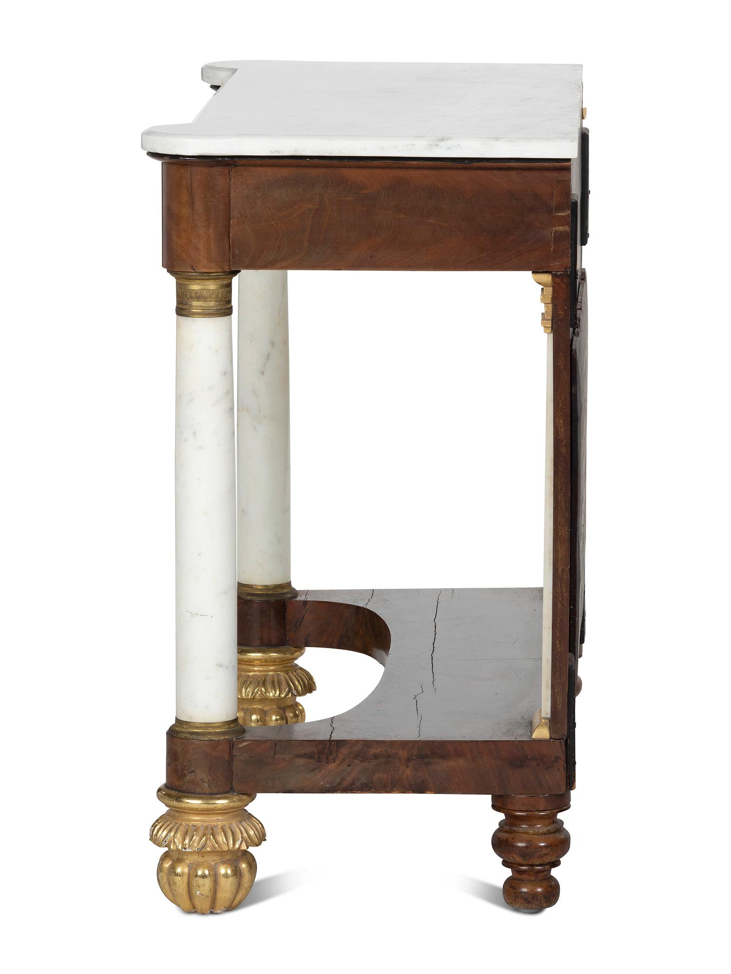 A Classical Parcel Gilt and Figured Mahogany Gilt-Metal Mounted Marble Top Pier Table