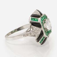 A Platinum, Diamond, and Gemstone Ring