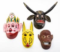 A Group of Eight Mexican Painted Wood Masks Height of first 12 inches.