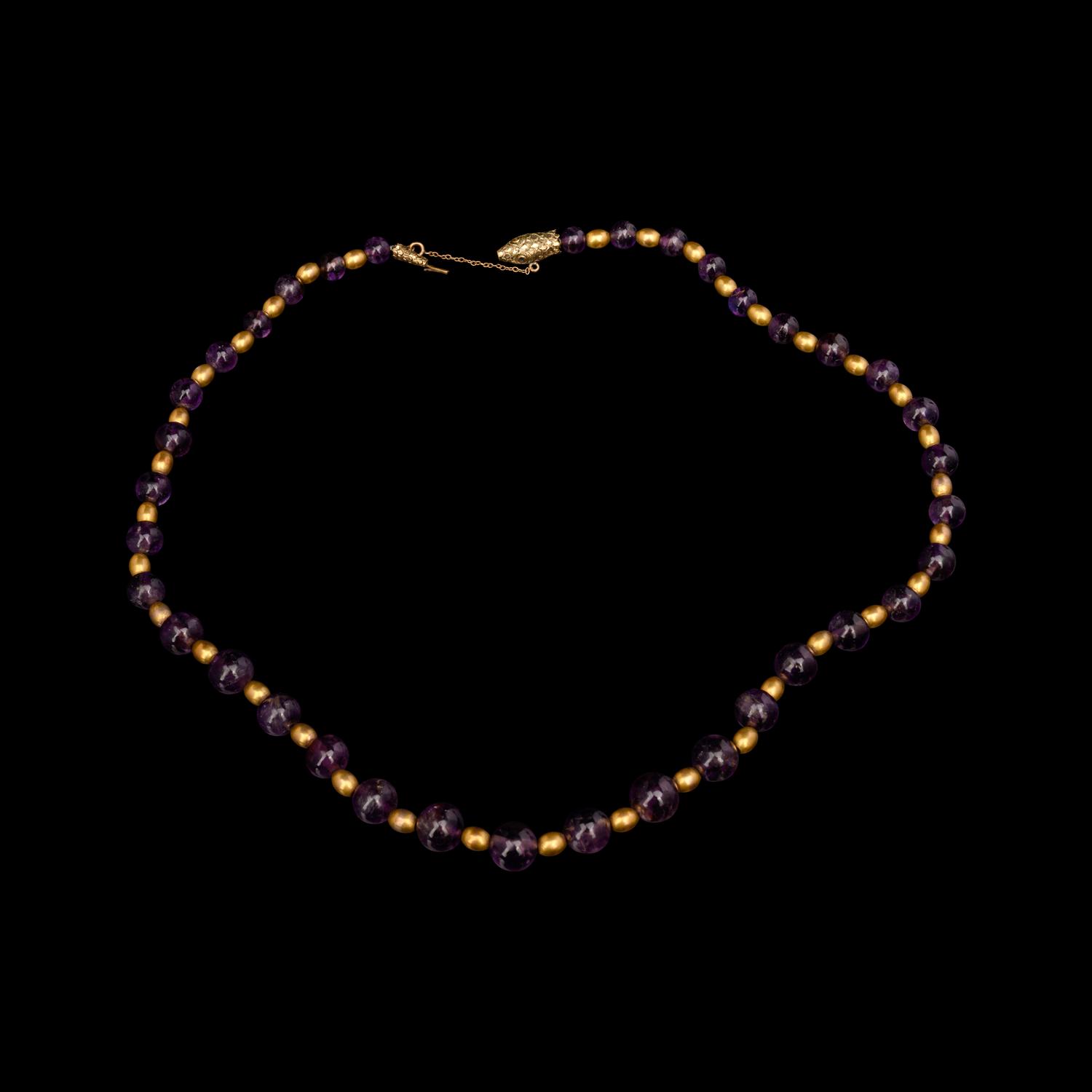 A Necklace of Amethyst and Gold Beads
