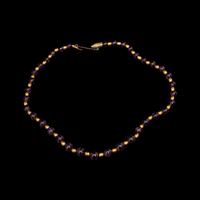 A Necklace of Amethyst and Gold Beads