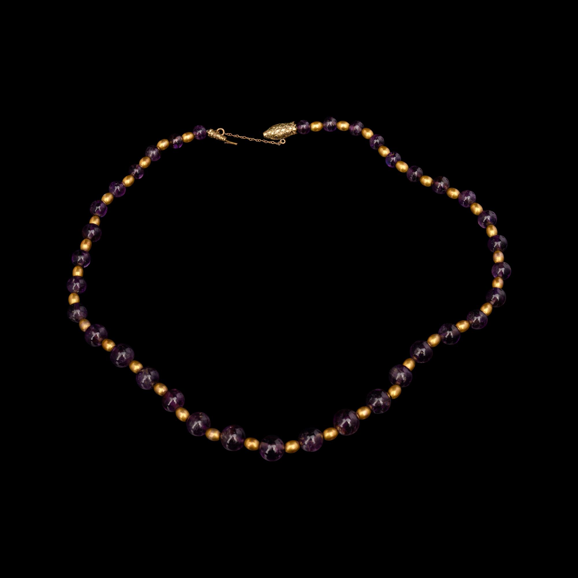 A Necklace of Amethyst and Gold Beads