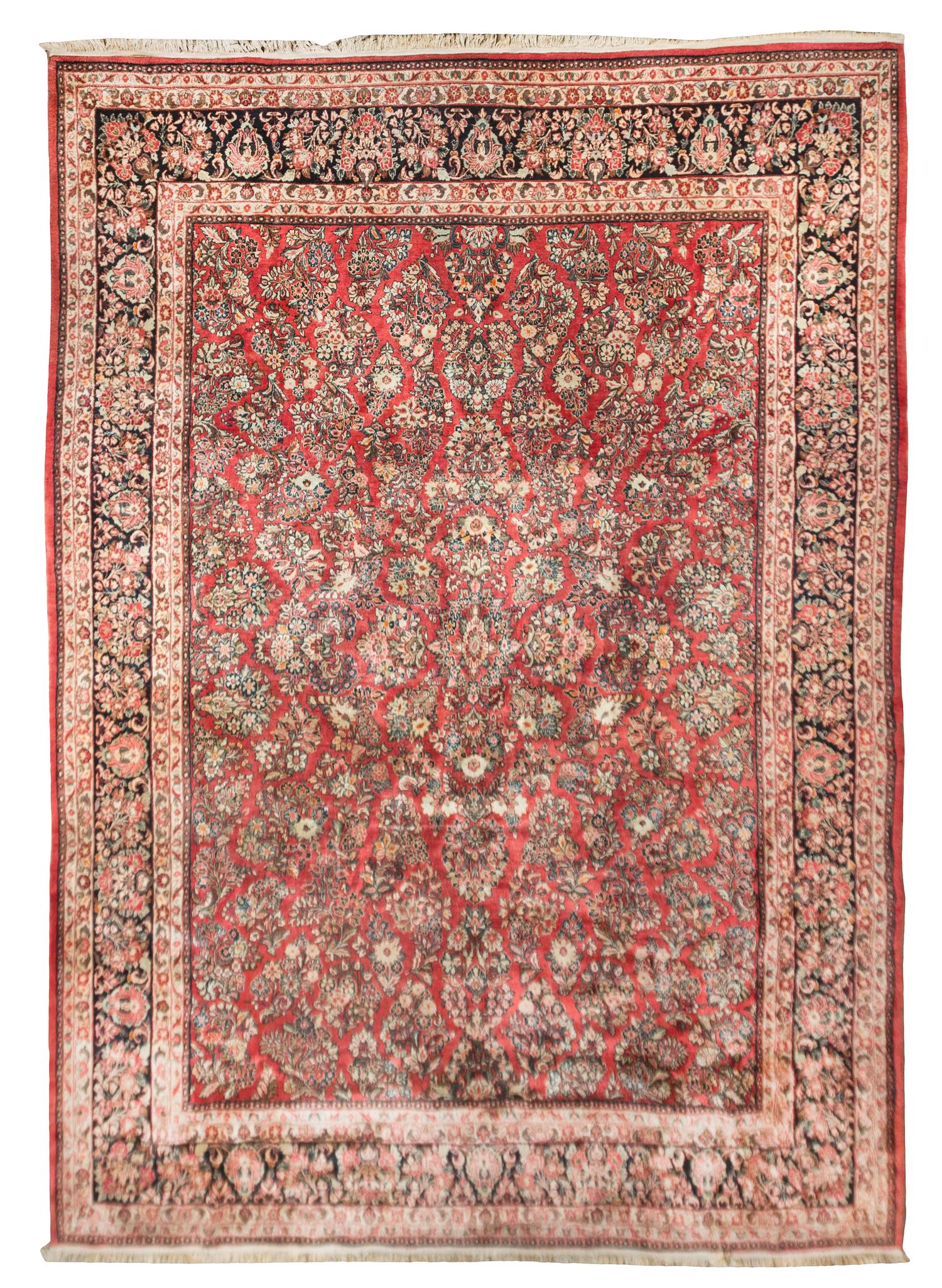 A Sarouk Wool Rug 10 feet 5 inches x 14 feet 9 inches. — circa 1950