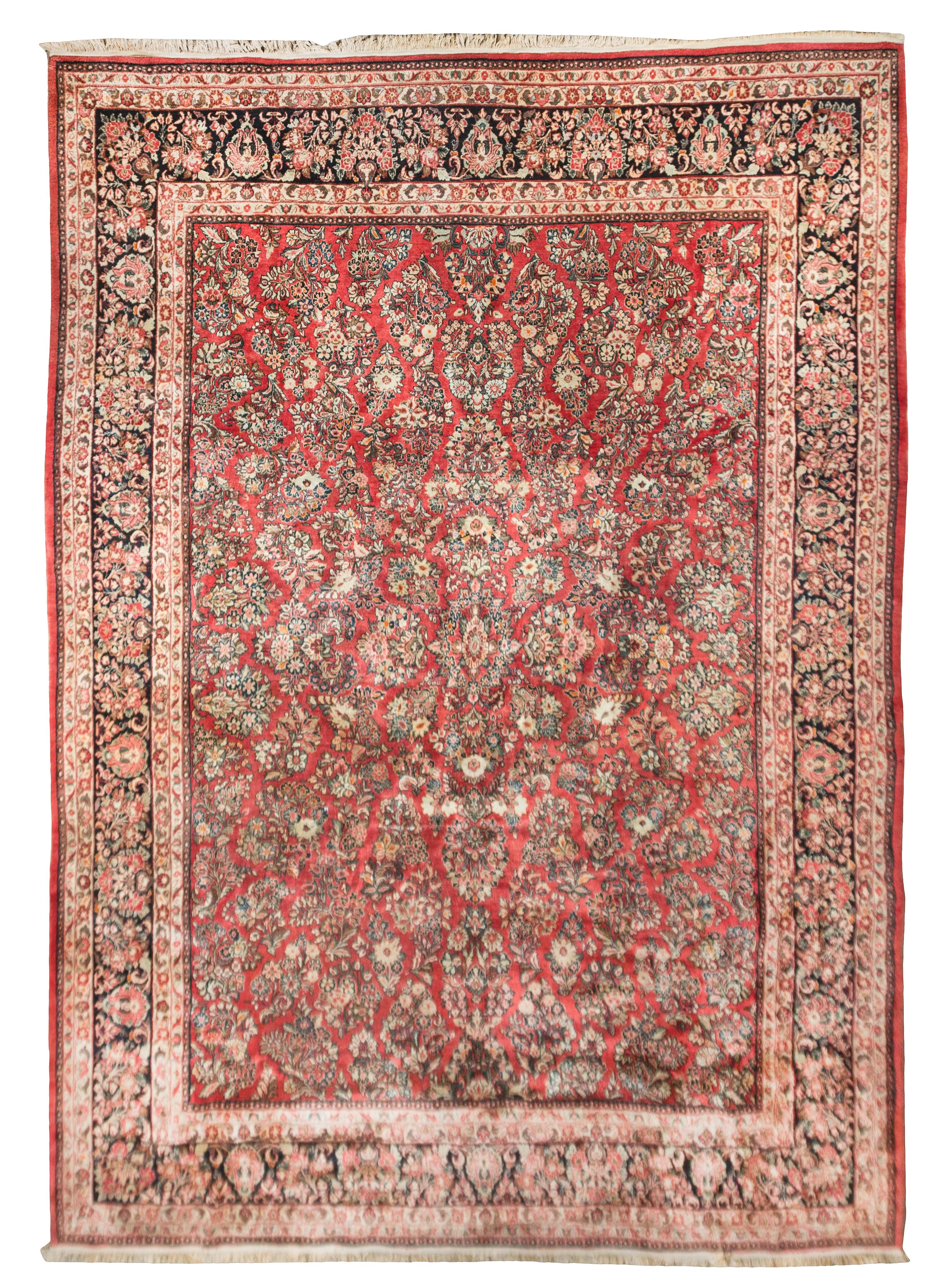 A Sarouk Wool Rug 10 feet 5 inches x 14 feet 9 inches. — circa 1950