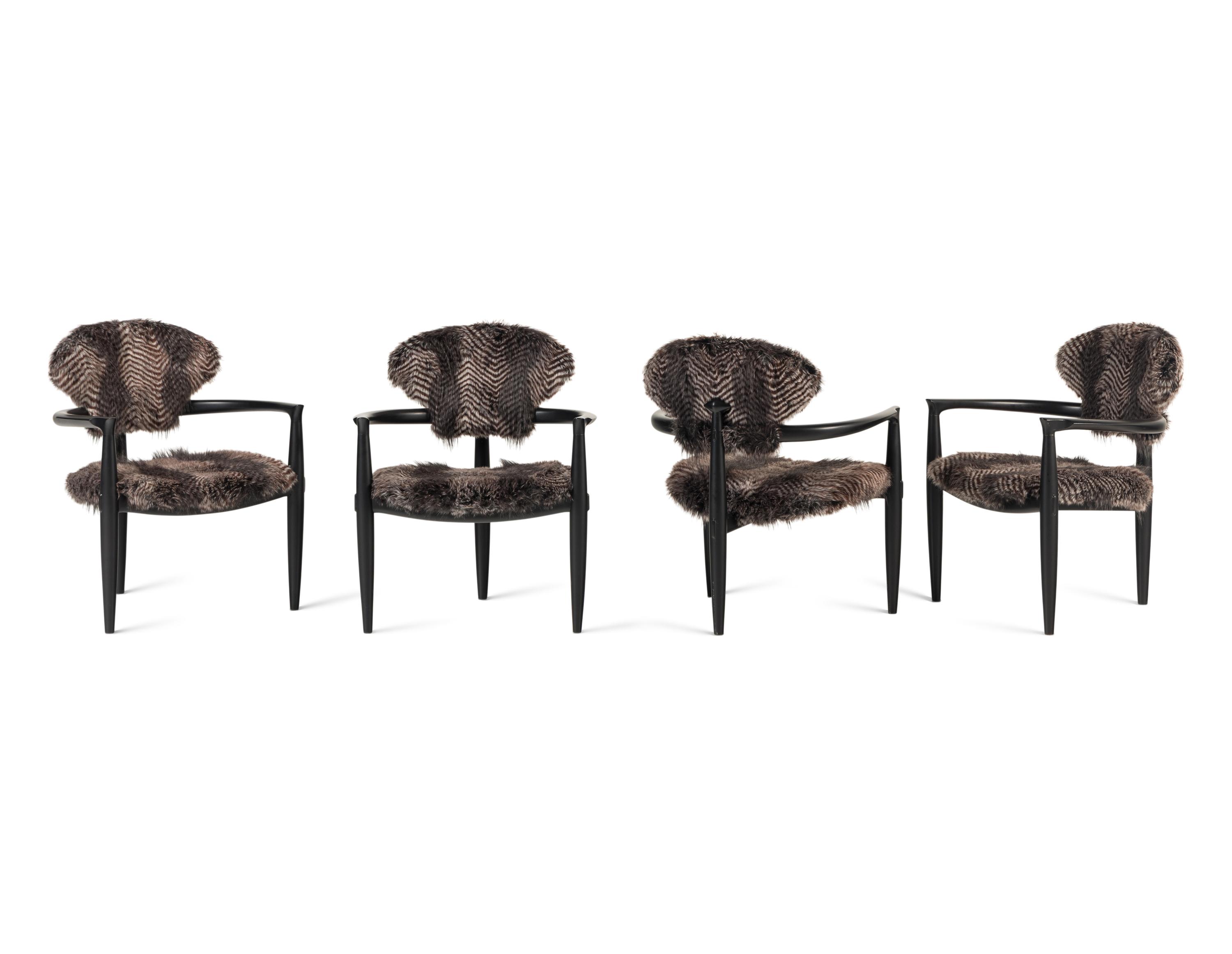 A Set of Four Faux Fur-Upholstered Ebonized Armchairs