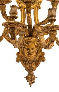 A Pair of Régence Style Gilt Bronze Seven-Light Sconces