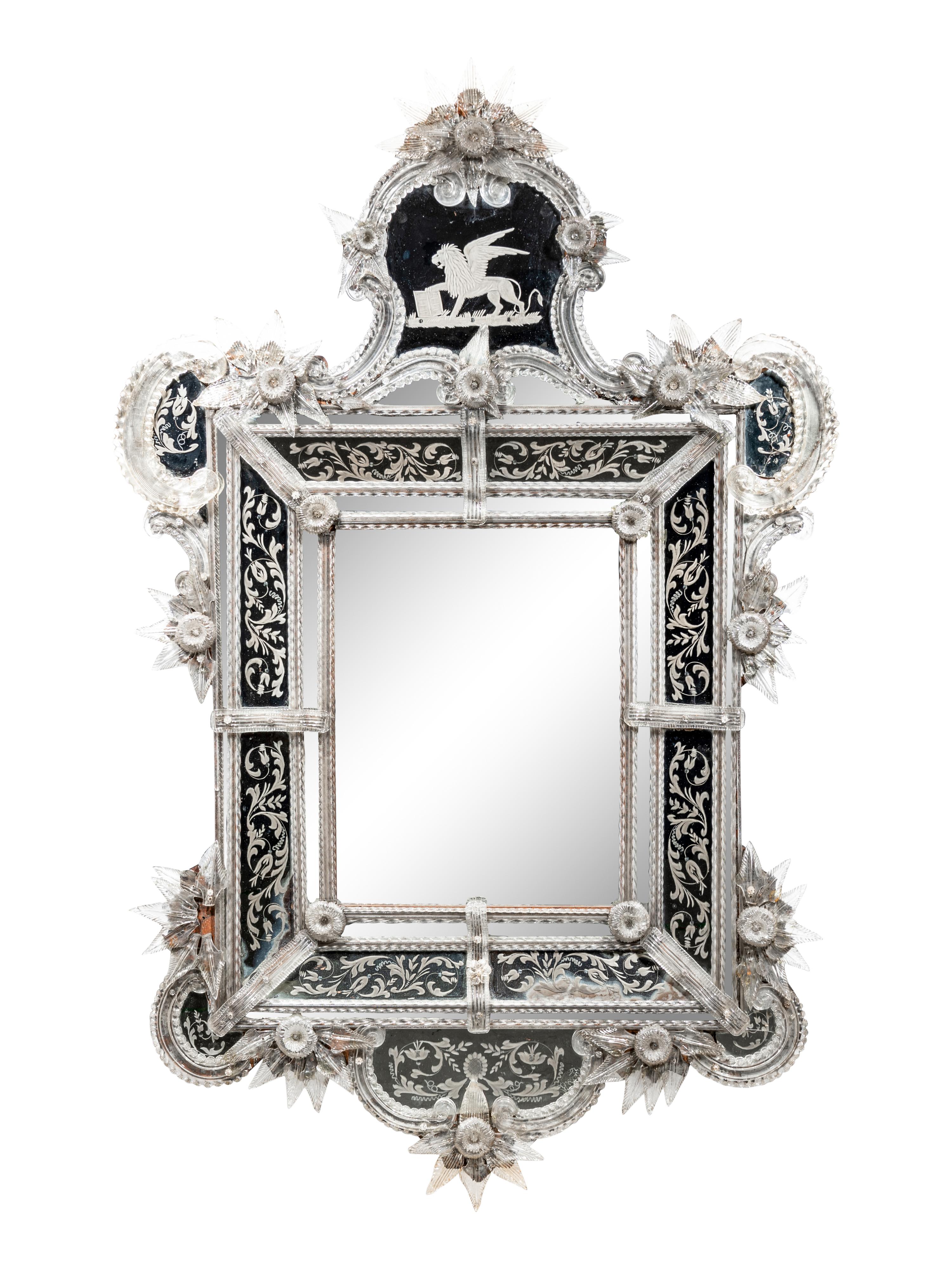 A Venetian Blown and Etched Glass Mirror