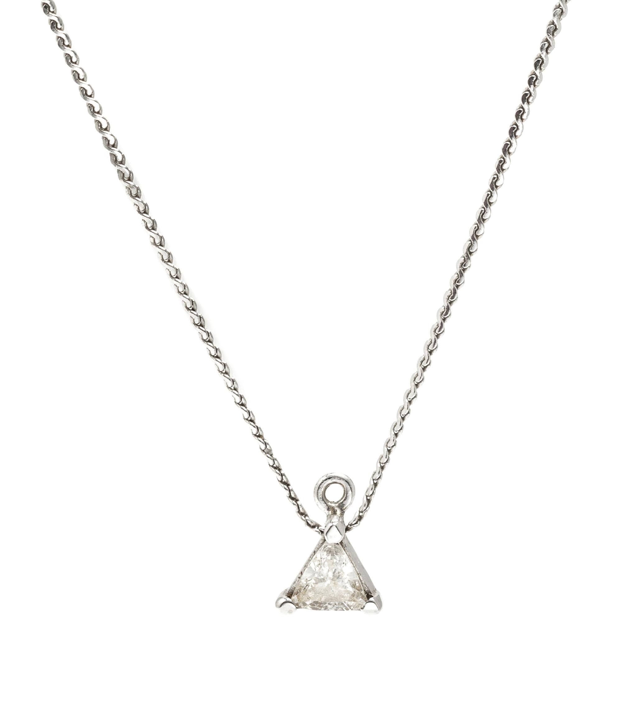 A 14 Karat White Gold and Diamond Solitaire Pendant, 1.20 dwts.