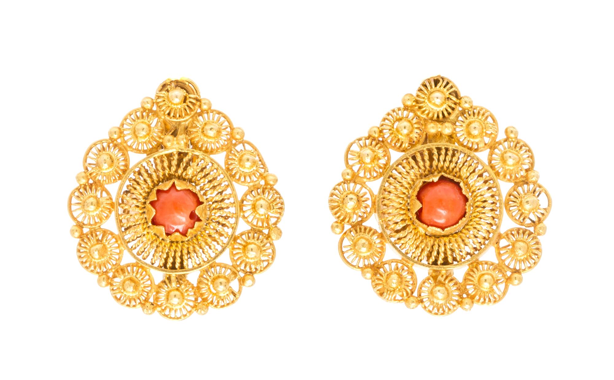 A Pair of 18 Karat Yellow Gold and Coral Earclips, 3.00 dwts.