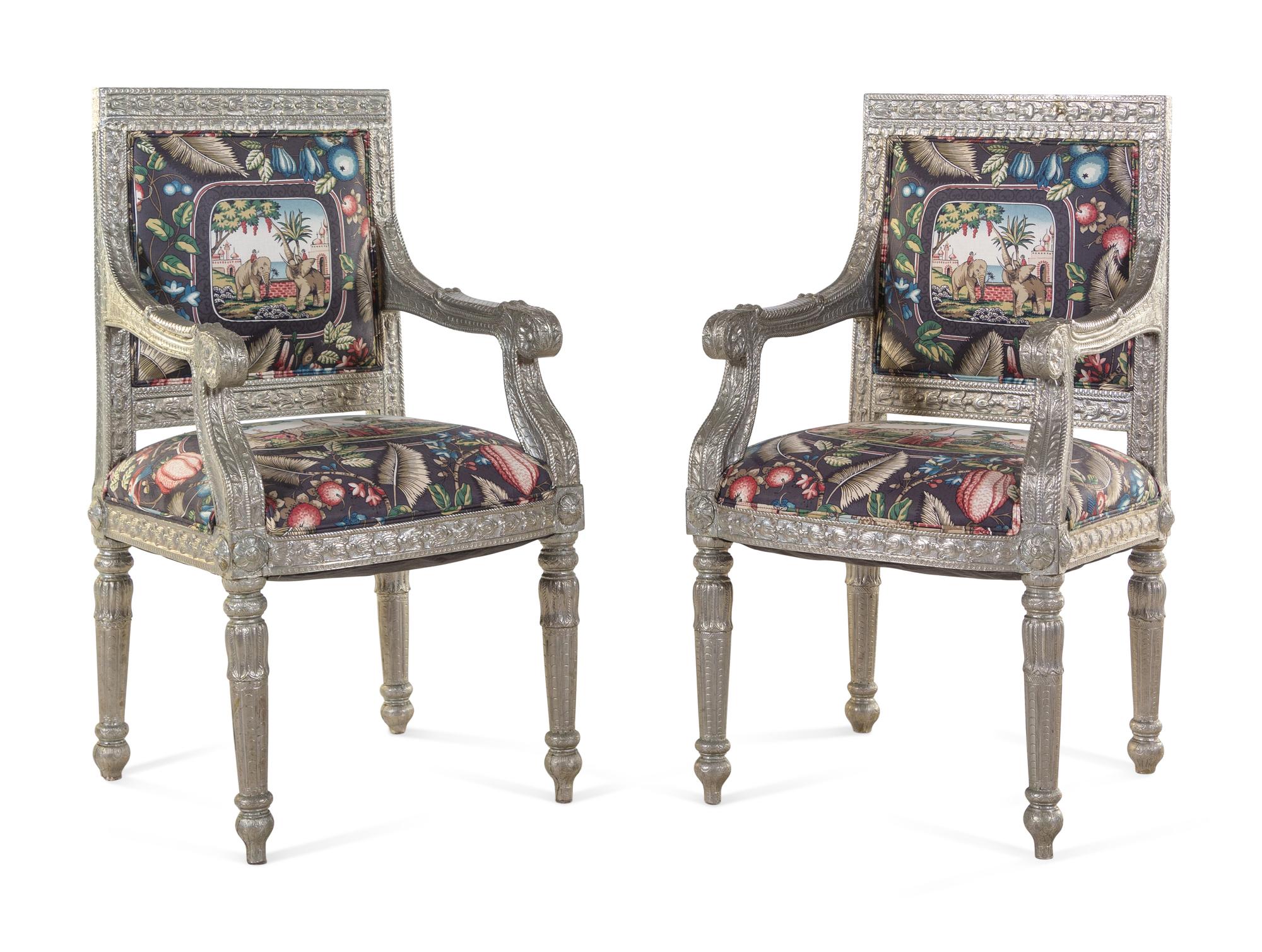 A Pair of Indian Silvered Armchairs