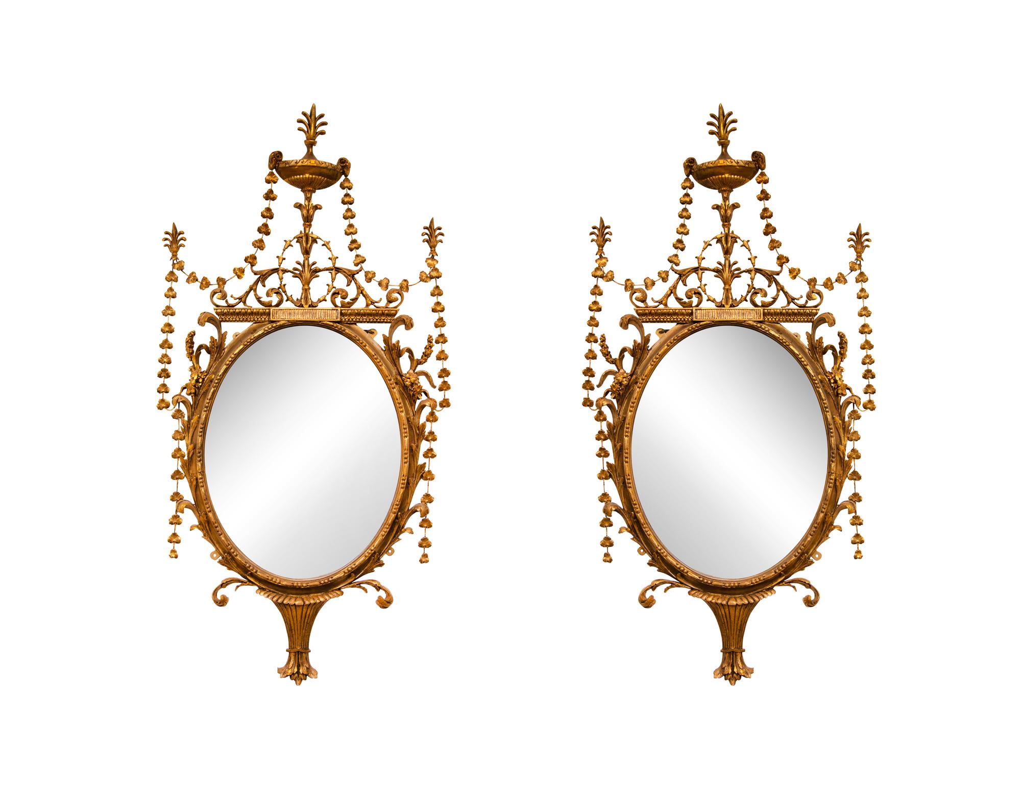 A Pair of George III Giltwood Mirrors