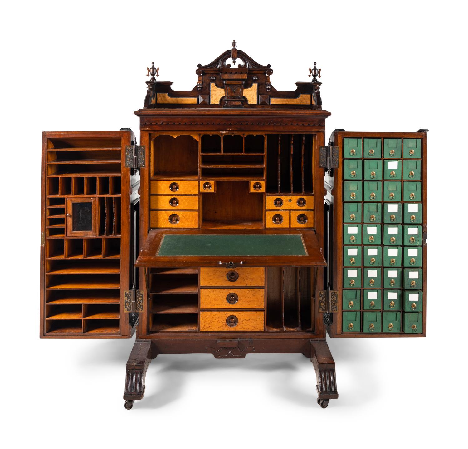 A Victorian Walnut and Bird’s Eye Maple Wooten Patent Desk