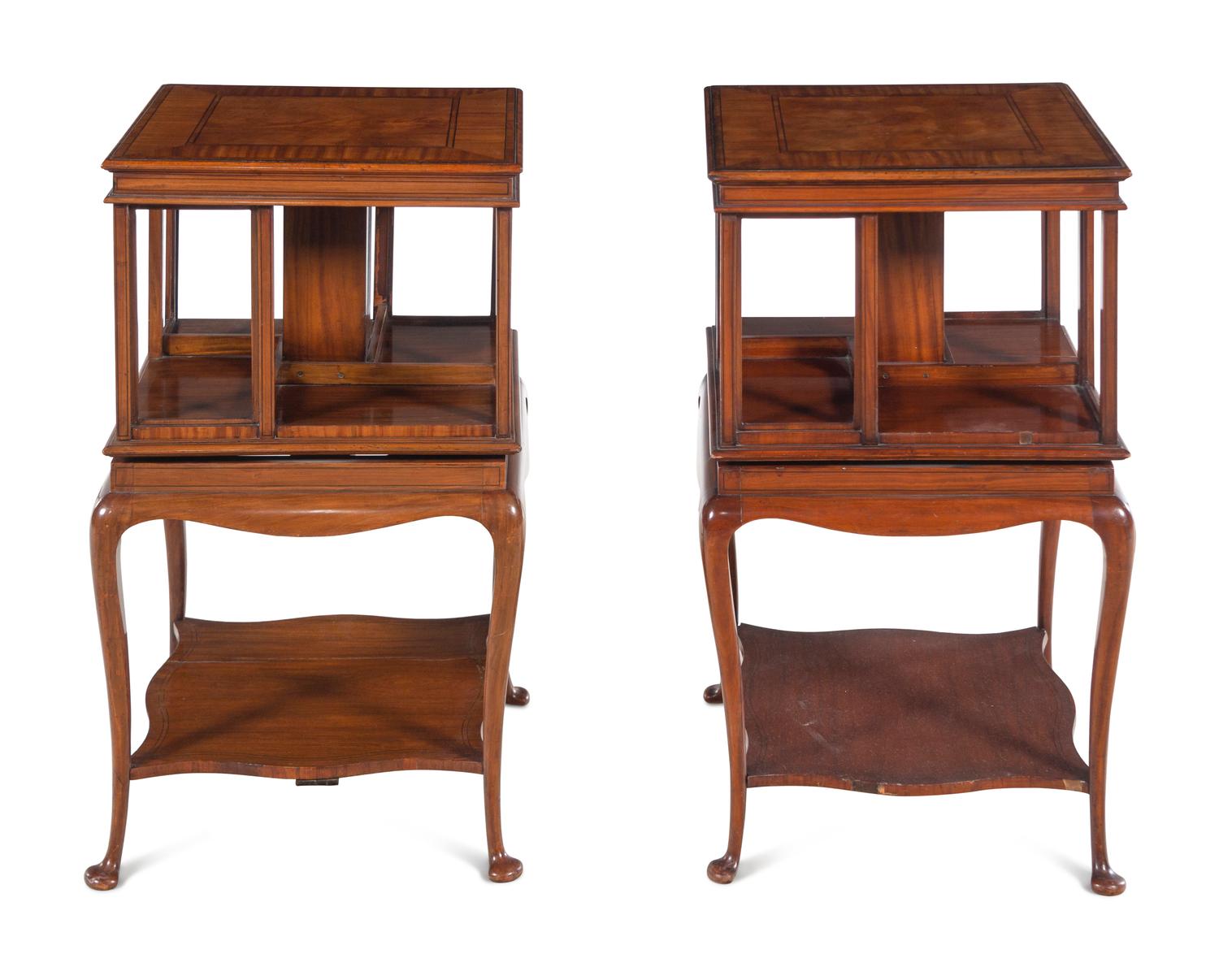 A Pair of Edwardian Satinwood and Mahogany Revolving Bookcases