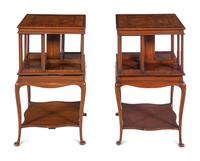 A Pair of Edwardian Satinwood and Mahogany Revolving Bookcases