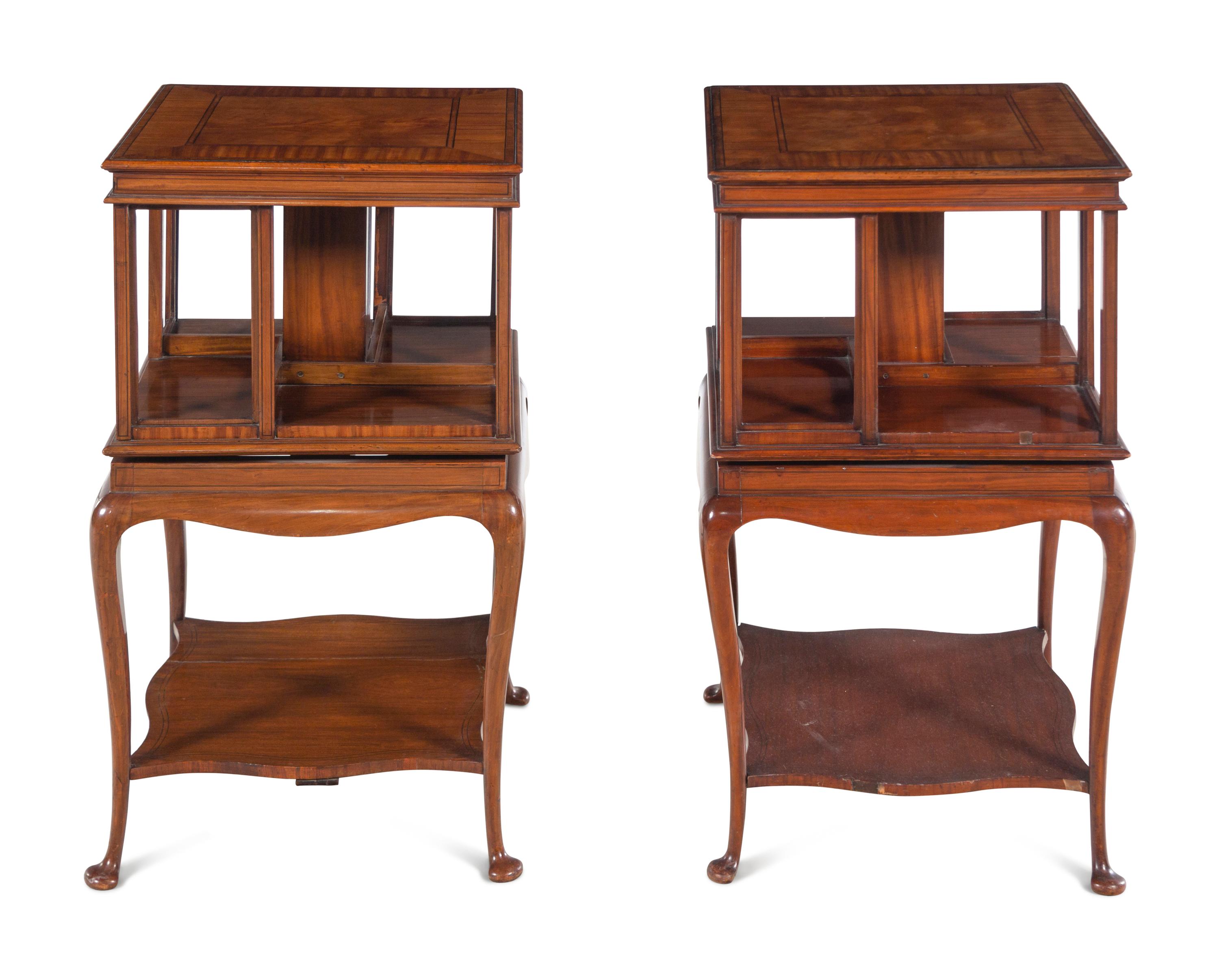 A Pair of Edwardian Satinwood and Mahogany Revolving Bookcases