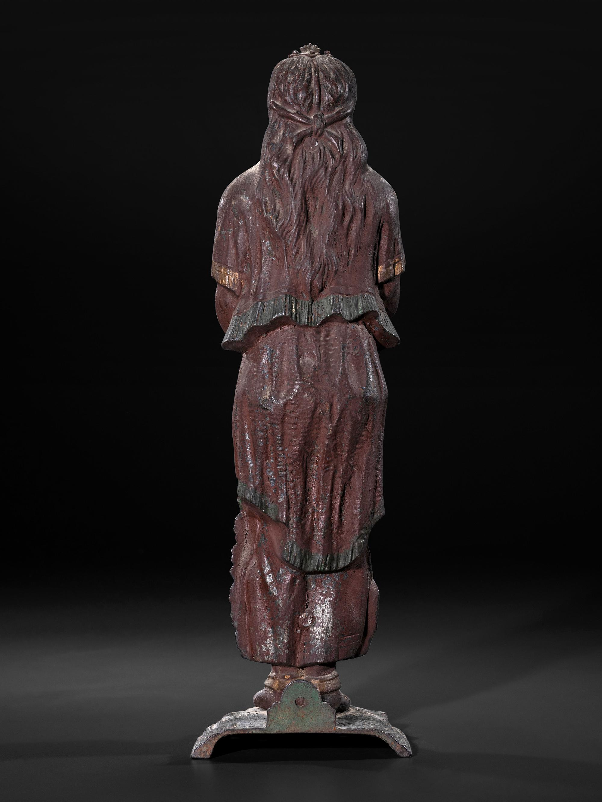 A Painted Cast Iron Tobacco Trade Figure of Native American Woman
