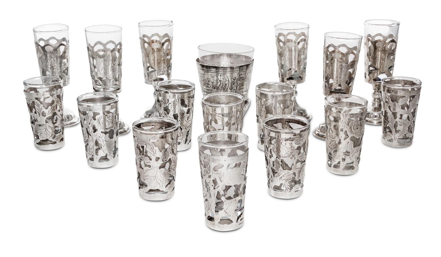 An Assembled Set of Mexican Silver Stemware, 20th Century, comprising 6 stems and 10 cordials with pierced and incised foliate decorati