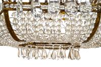 An Italian Beaded Gilt Metal Six-Light Chandelier with a Rope Canopy