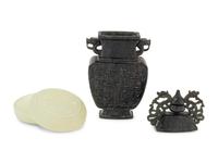 A Small Chinese White Jade Circular Covered Box and A Chinese Dark Spinach Jade Covered Vase