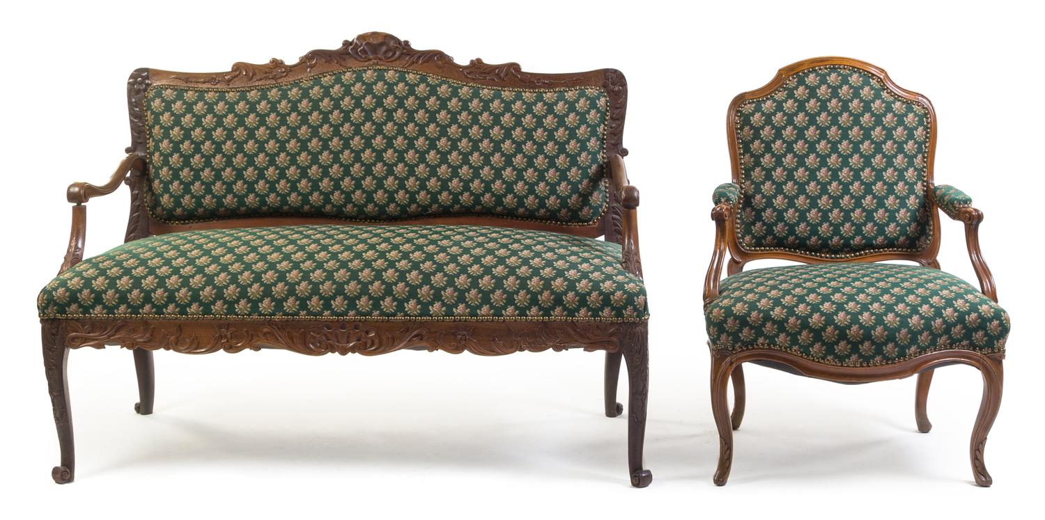 A Louis XV Style Oak Settee and Fauteuil Height 38 1/2 x width 53 x depth 23 inches.
