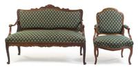 A Louis XV Style Oak Settee and Fauteuil Height 38 1/2 x width 53 x depth 23 inches.