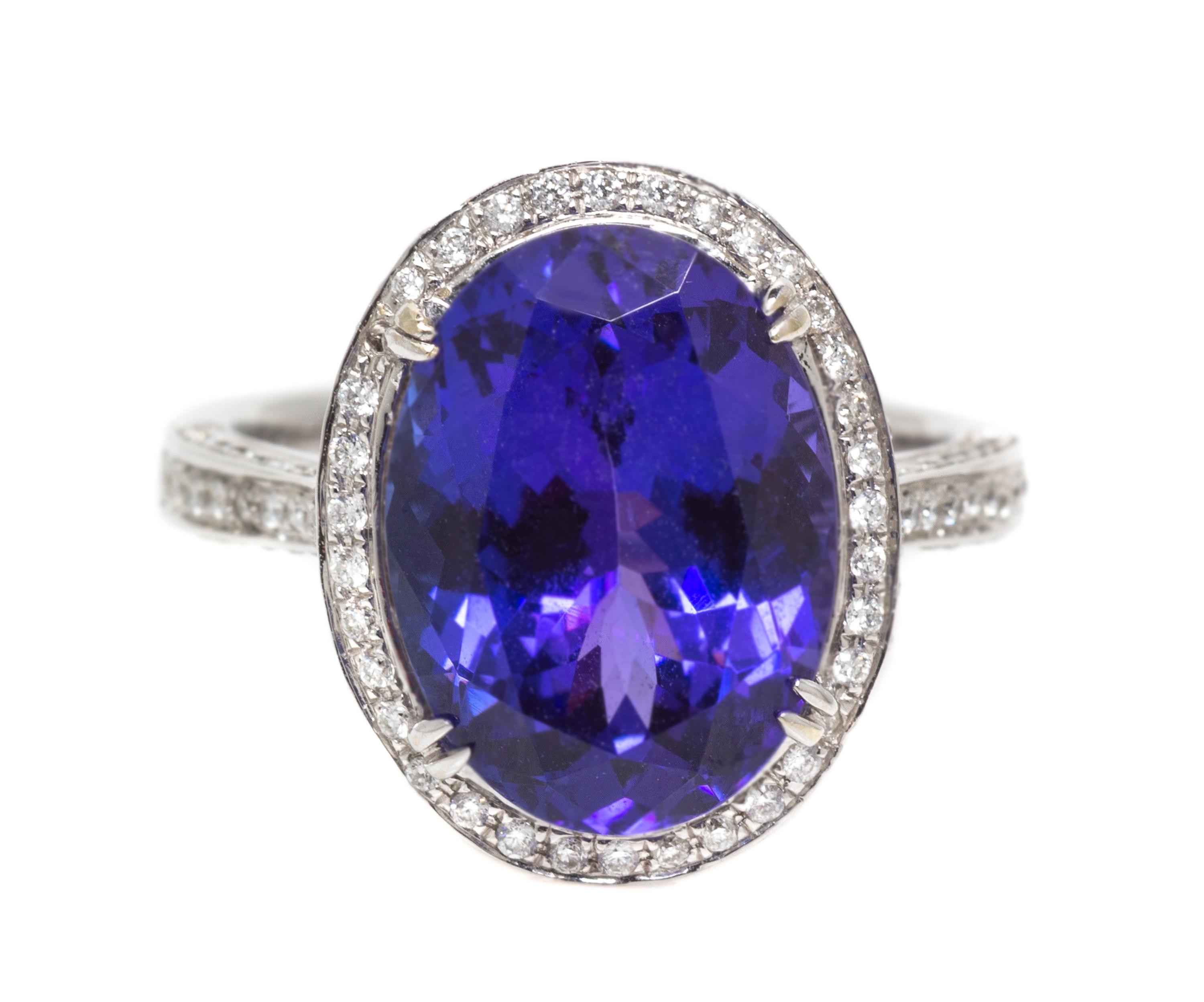 An 18 Karat White Gold Oval Cut Tanzanite and Diamond Ring, 5.10 dwts.