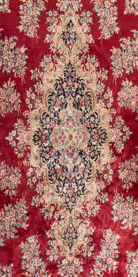 A Kirman Wool Rug