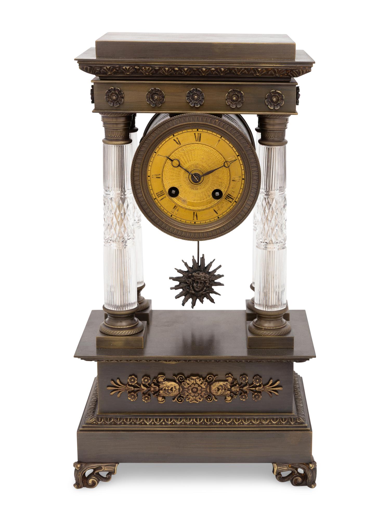 An Empire Style Bronze and Cut Glass Mantel Clock