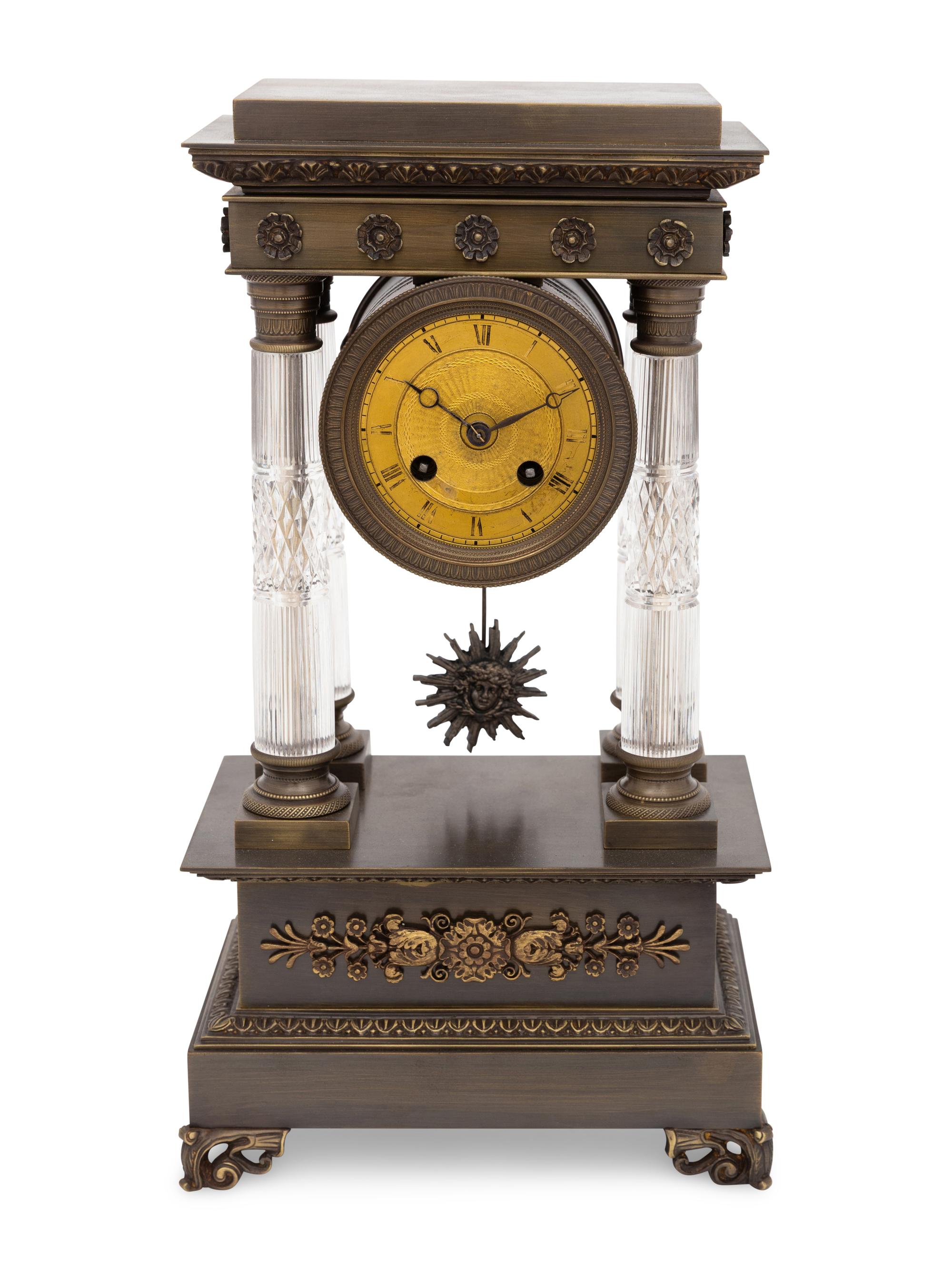 An Empire Style Bronze and Cut Glass Mantel Clock