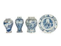A Group of Thirteen Delft Earthenware Plates and Chargers