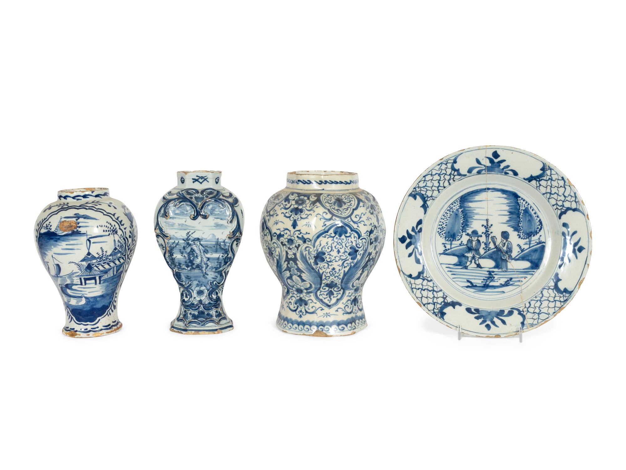 A Group of Thirteen Delft Earthenware Plates and Chargers