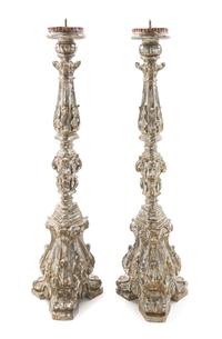 A Pair of Venetian Silvered and Carved Wood Prickets Height 30 3/4 inches. — 20TH CENTURY