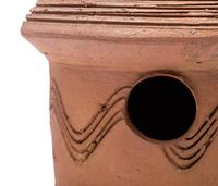 An Incised Sewer Tile Birdhouse