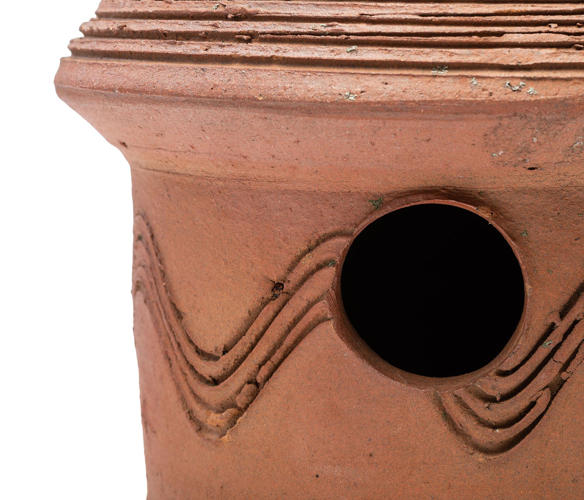 An Incised Sewer Tile Birdhouse