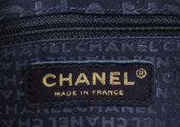 A Chanel Blue Suede Quilted Shoulder Bag, 10" x 6" x 1.5".