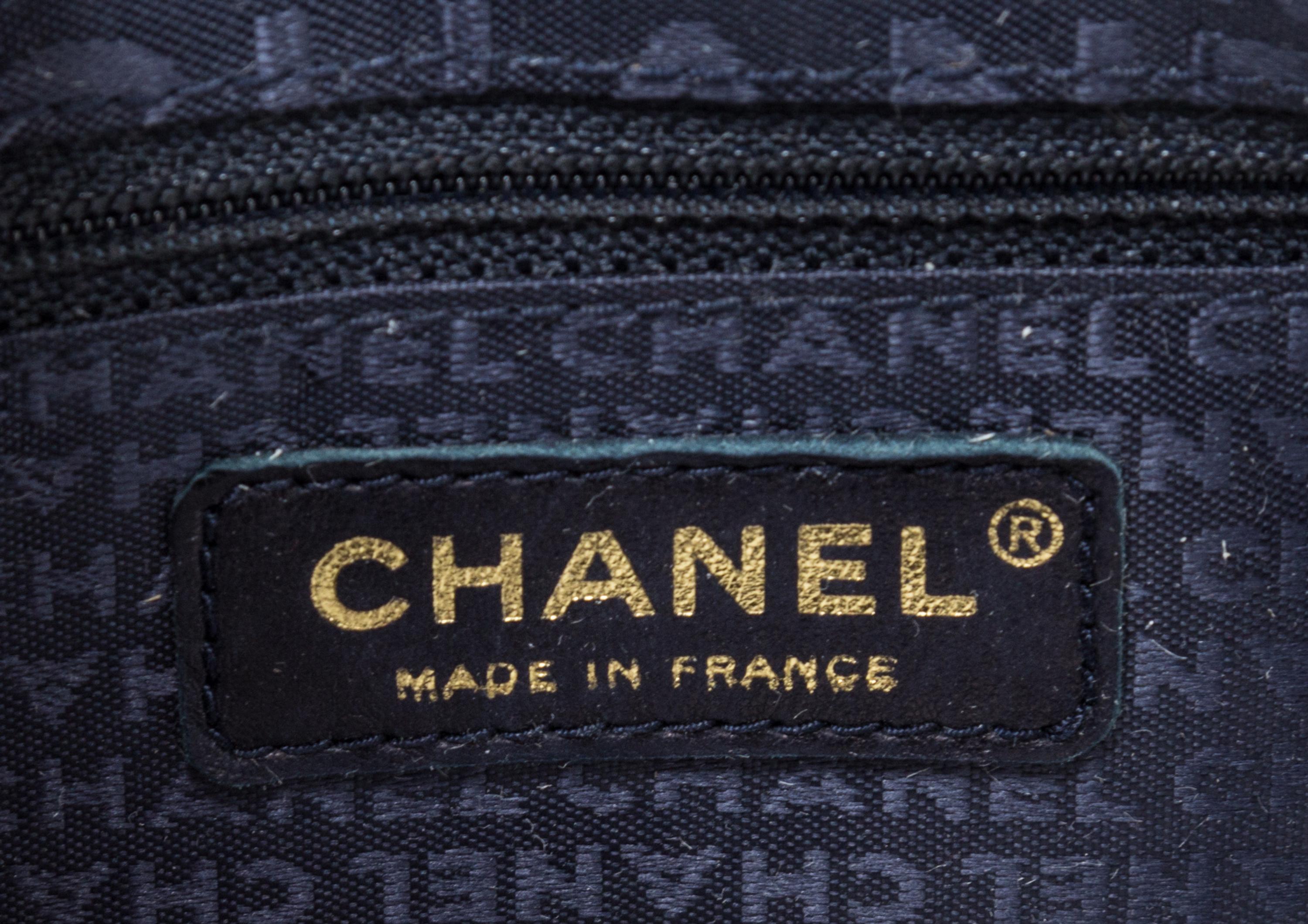 A Chanel Blue Suede Quilted Shoulder Bag, 10" x 6" x 1.5".