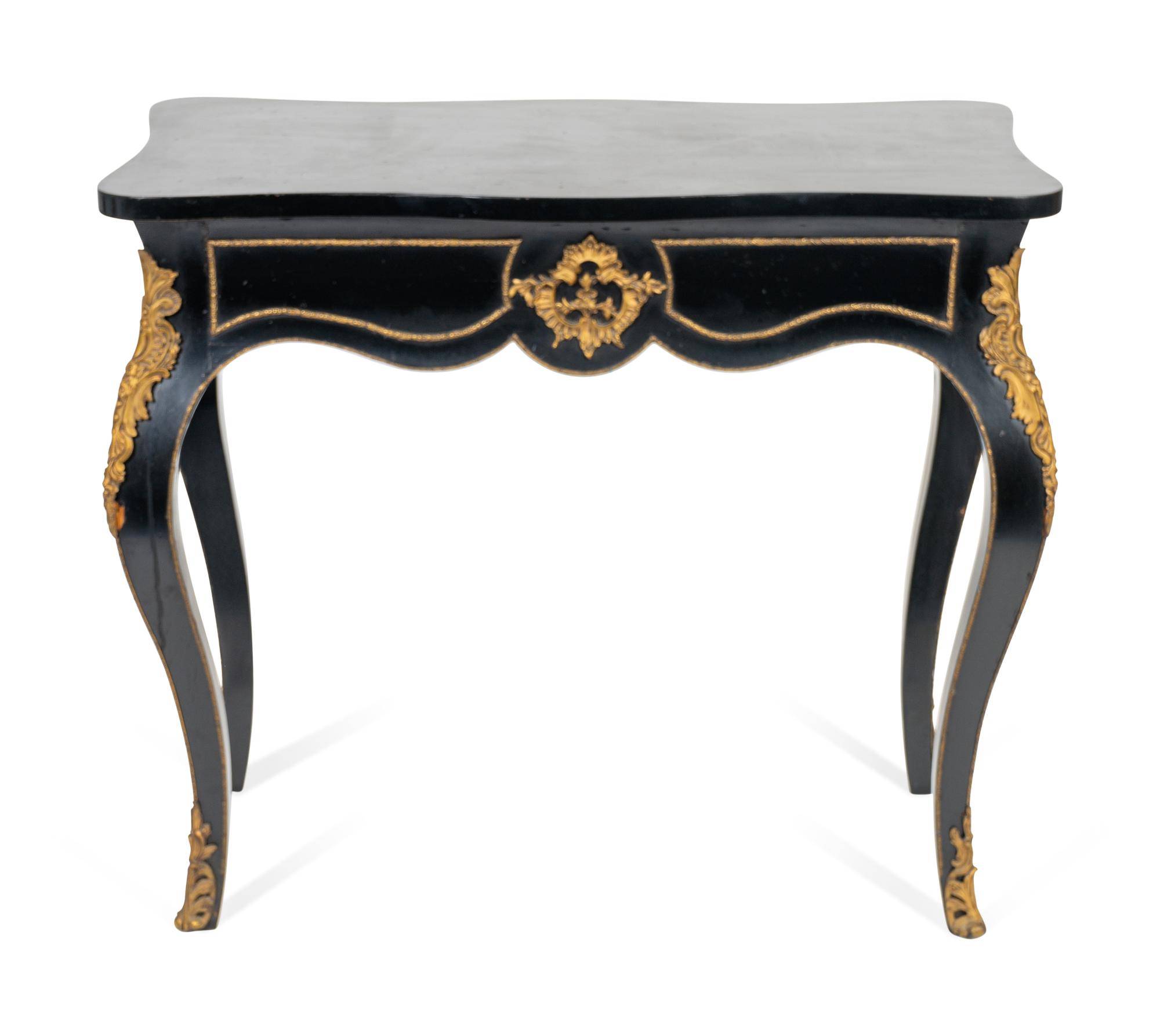 A Louis XV Style Gilt-Metal-Mounted Ebonized Console