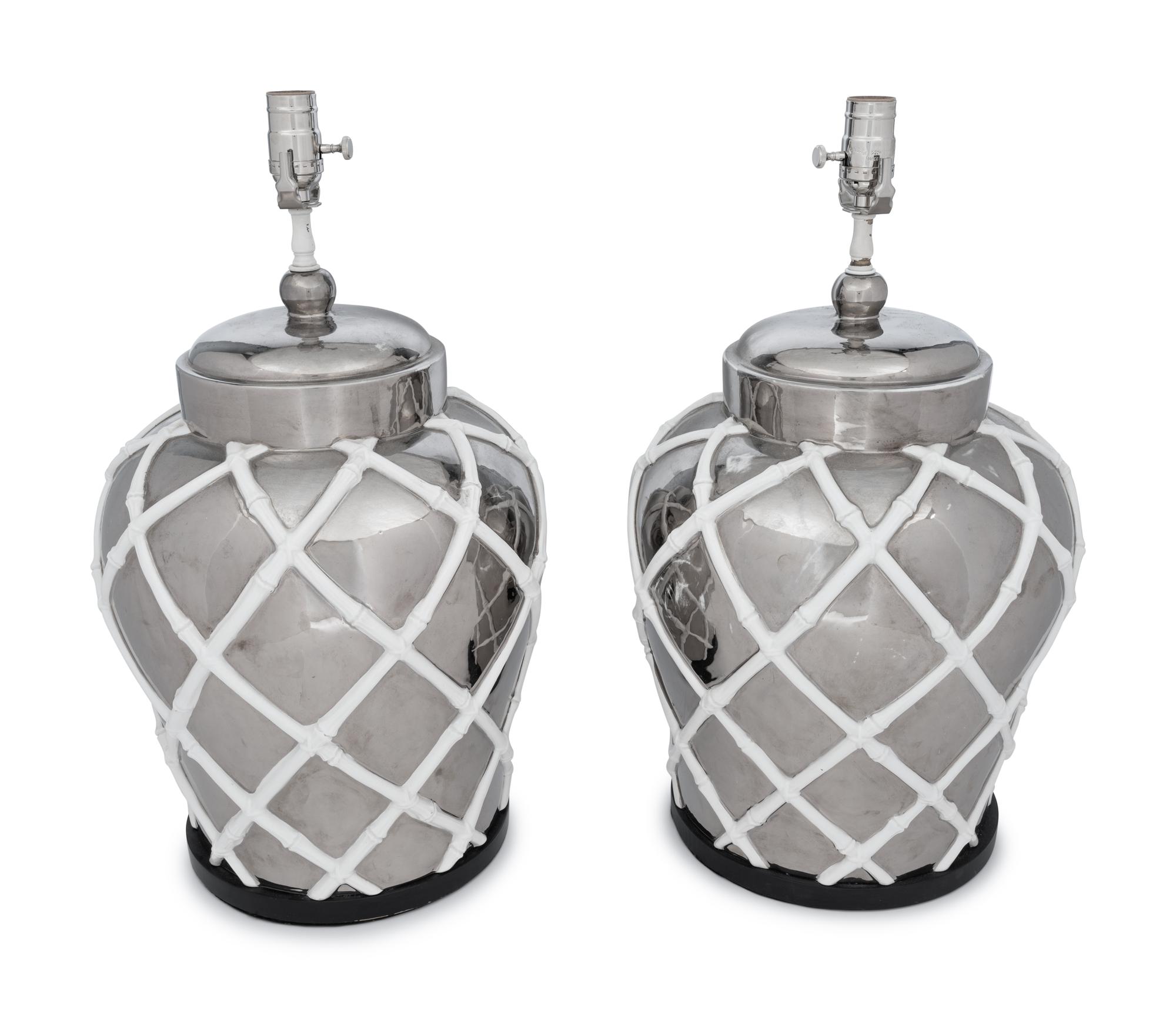 A Pair of Silvered and White Glazed Table Lamps